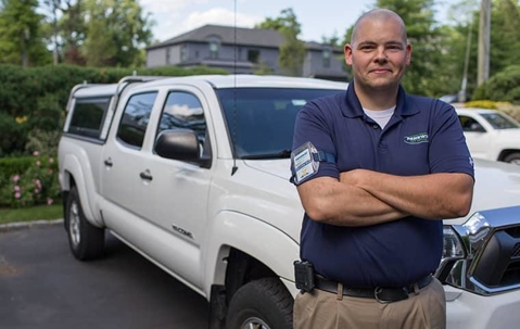 Green pest control worker