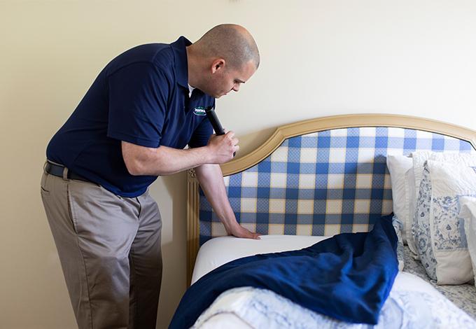 Pest Control Technician conducting an inspection